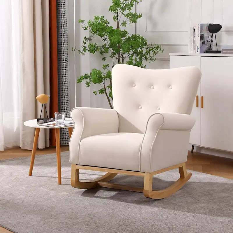 Fauteuil à bascule à dossier haut et capitonné