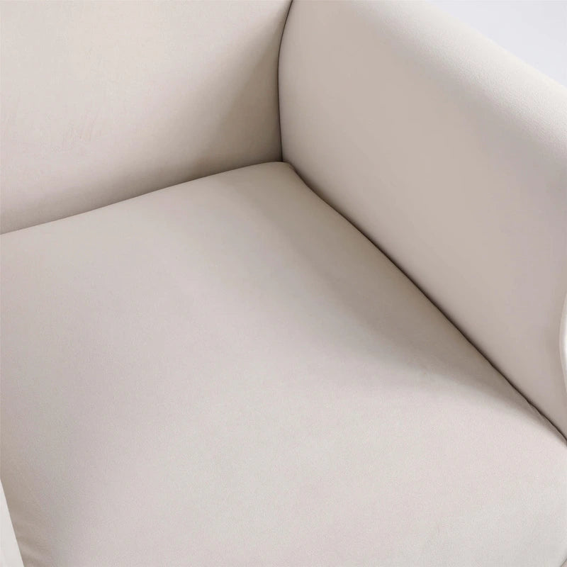 Fauteuil à bascule à dossier haut et capitonné