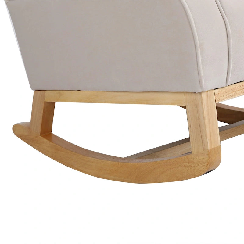 Fauteuil à bascule à dossier haut et capitonné